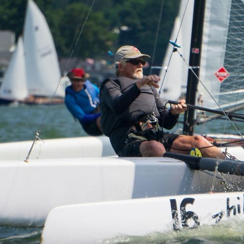 Man on a Catamaran racing