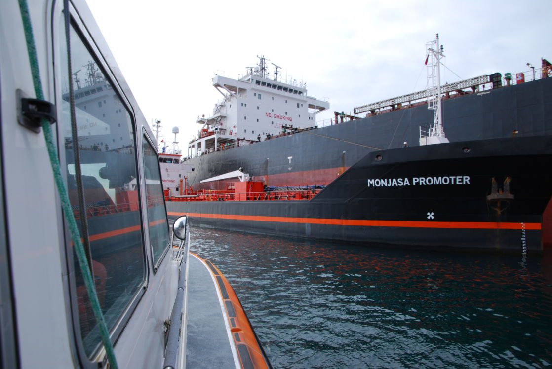 View from pilot boat towards the side of a vessel