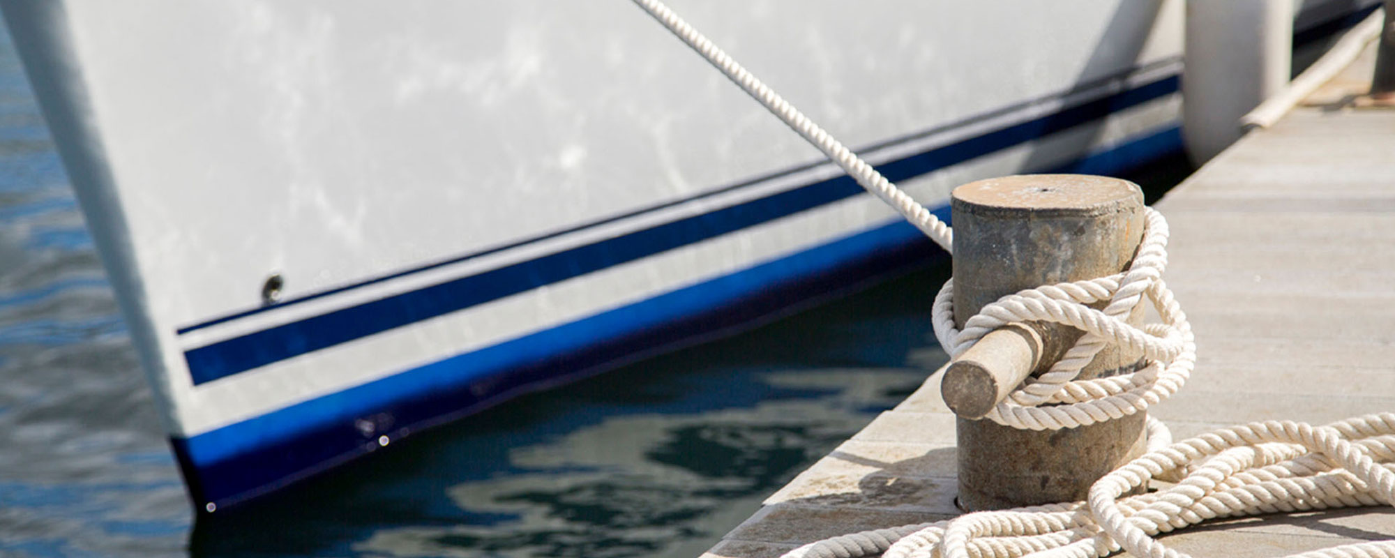 Yacht tied up on pontoon