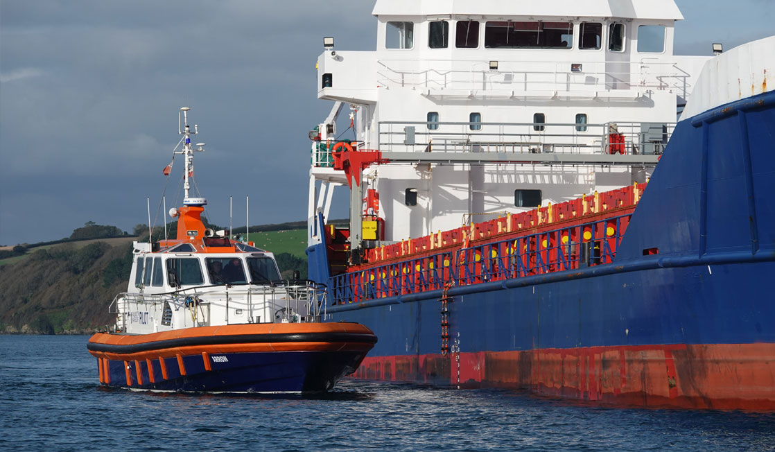 Pilot boat, Arrow draws along side a larger vessel