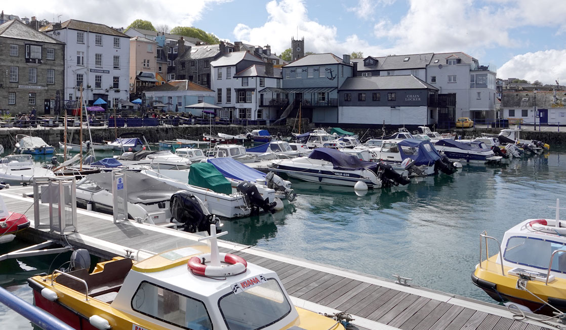Boats in basin quay