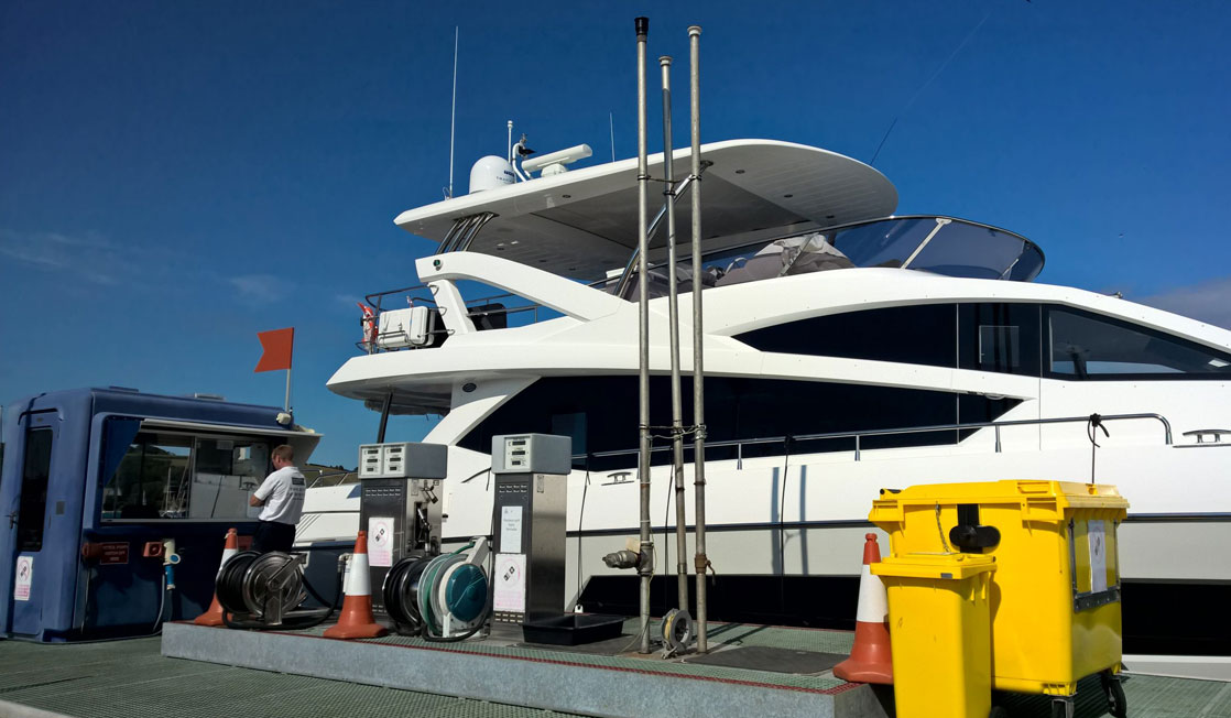 Power boat fuelling at the fuel pontoon