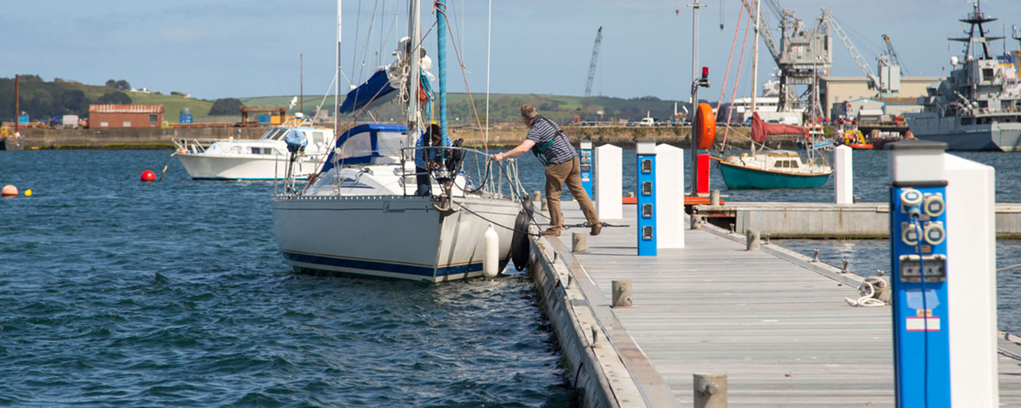 Boat tied to pontoon
