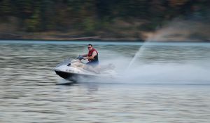 Man speeding on a Jet Ski
